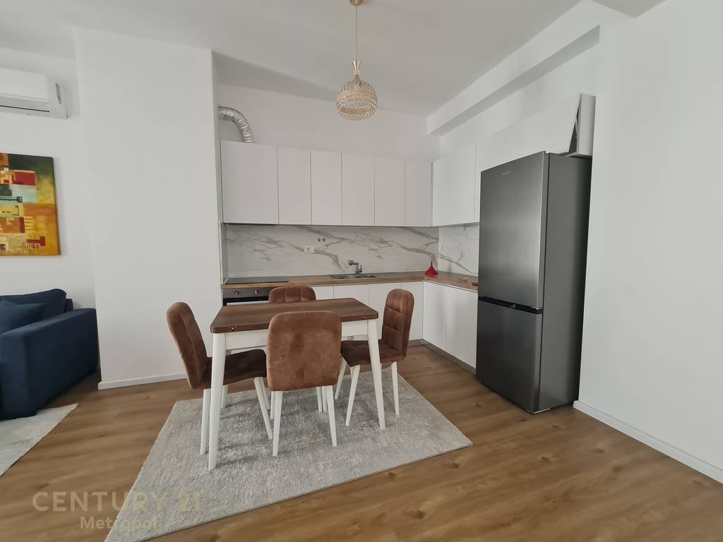 Her 1+1 apartment is fully furnished in the Kaimi Residence!