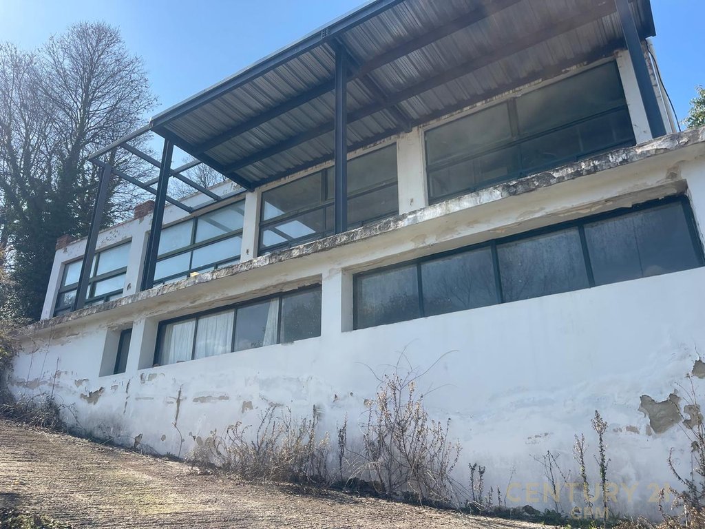 Land and Building for Sale near TEG