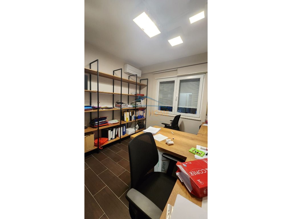 Qira, Office Space + Parking Lot, Center