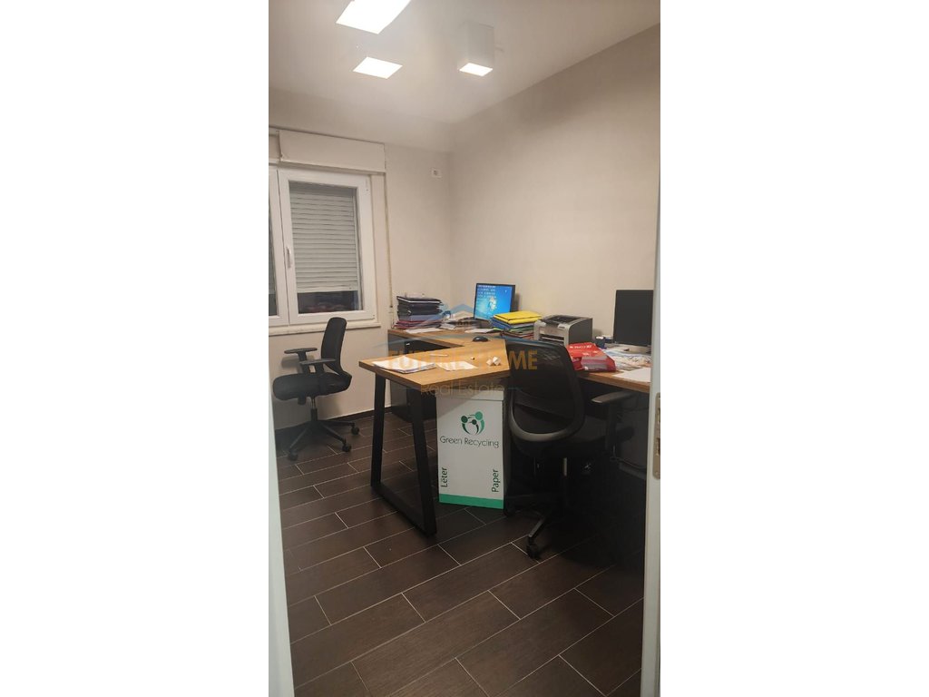 Qira, Office Space + Parking Lot, Center